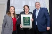 Boutique Hotel of the Year 2024 - Paula McIntyre on behalf of Elephant Rock Hotel, Portrush with Georgina Campbell and Richard Corrigan. CREDIT NEWS LETTER