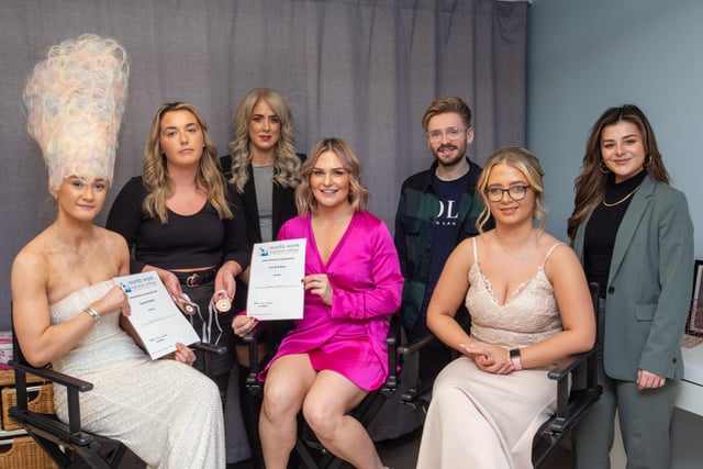 Level 3 Hairdressing student Rebecca Holmes (second from left) Abbie Alexander, Jessica Trainor and Larisa Grimsdell with judges who are all past students Emma Bradley, Christopher Young, and Hannah McCurdy. 