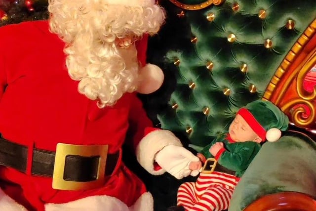 This cute little one meets Santa for the first time. Picture: Zoe O' Reilly