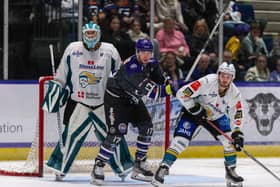 Belfast Giants goalie Tyler Beskowarany and defenceman Jeff Baum in action  during last Friday's game against the Glasgow Clan at Braehead. It was a game that the Giants went on to win 4-2. Picture: Al Goold