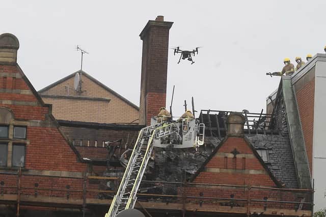 Firefighters tackling the blaze at Belfast's Cathedral Quarter. Picture: Pacemaker