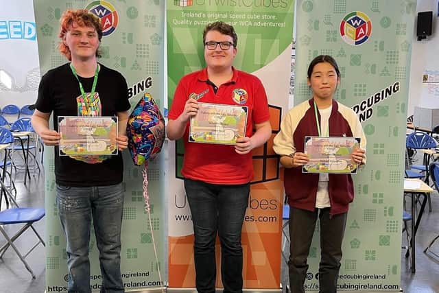 Alexander (left) pictured following the event in Kilkenny on August 6. (Photo by Speedcubing Ireland).