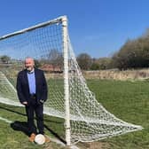Councillor Brian Higginson has announced the reopening of the Carryduff football pitch. Pic credit: LDRS