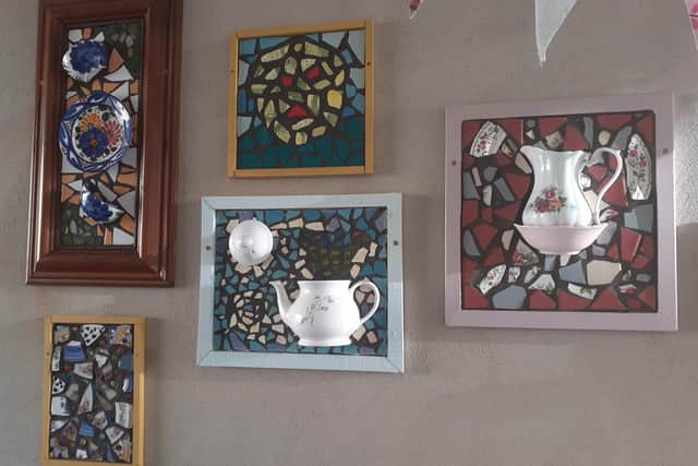 Some of the beautiful pieces of tiled mosaic art tiles created by the Atlas Women's Centre service users in their classes. Image credit: Contributed by Atlas Women's Centre