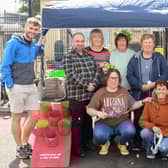 Pictured at the Millburn Smile Project’s fun day are (back row from left) Joel Cromie, Housing Executive Patch Manager, Gareth Doran, Housing Executive Good Relations Officer, Jenny Millar, Margaret Glendinning, Stella Boyd, Millburn Community Association, Billy Ellis, Millburn Community Outreach worker.  Including (front row from left) Karen Douglas and Marilyn Donaghy of Millburn Community Association. Credit NI Housing Executive
