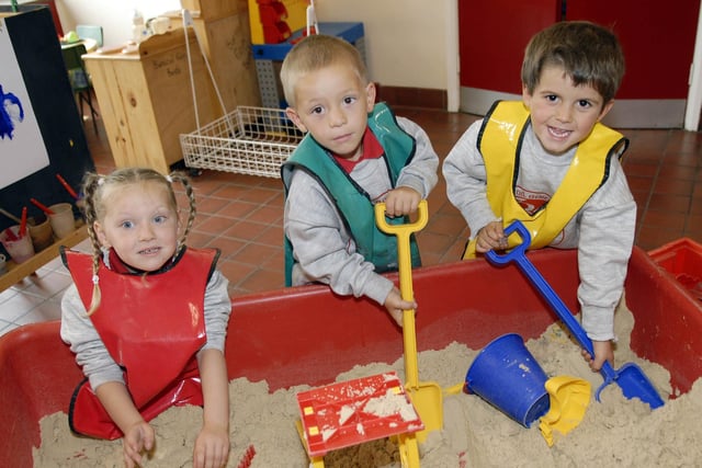 Enjoying playing in the sand pit during their first days at the Irish language based Bunscoil Eoin Baiste in 2007 are new P1 pupils from left, Meagan Nig Loingsigh, Ciarán Mac Branaigh and Rónán Mac Giolla Mhíchíl.