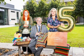 Mayor of Antrim and Newtownabbey, Councillor Henry Cushina is joined by Chloe Anderson and Mikayla Cartright from the Environmental Health Team to launch Winter Woollies at 5.