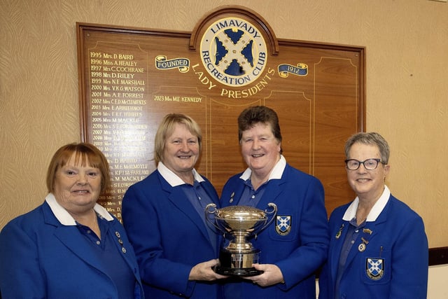 The Ladies Bowls team Des Baird, Noelle Graham, Valerie Witherow and Norma Marshall holding one of their many trophies won playing for the club.