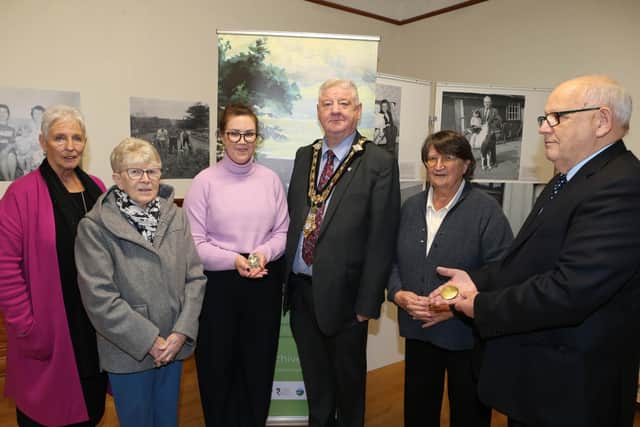 Mayor of Causeway Coast and Glens, Councillor Stephen Callaghan along with Joanne Honeyford (Community Engagement Officer, Museum Services), Isobel Gamble, Sarah Calvin (Museum Services Development Manager),Sally Forwood and Ronnie Gamble. Credit Causeway Coast and Glens Council