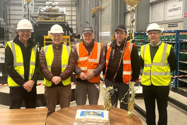 Justin Donnelly (centre) with (L-R) Gerry Quinn, Helpdesk Engineer, Kieran Hegarty, President – Terex Materials Processing, Barry McMenamin, Business Line Director, Terex Washing Systems and Pat Brian, Vice President, Aggregates celebrating Justin’s 55 years’ service with Terex. Credit: Submitted