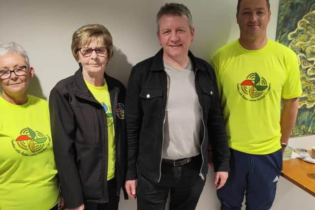 Justin McGurk with members of the FACTS team at Mrs Browne's Nosey Neighbour.