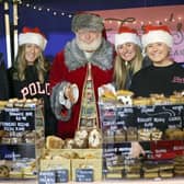 Pictured at the market with Santa are (l-r) Cllr John Laverty BEM, Chairman of the council’s Regeneration & Growth Committee; Ella Brown, Beth Stephenson and Tori McCaughey of Tori’s Coffee, Bakes and Cakes. Pic credit: Stephen Davison