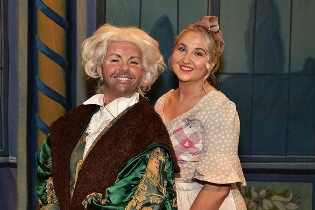 Daddy's girl...Berie Baine, left, who plays the 'Baron' and Laura Clayton who plays 'Cinderella' in the Gateway Theatre Group 40th anniversary pantomime, 'Cinderella'. PT01-239.