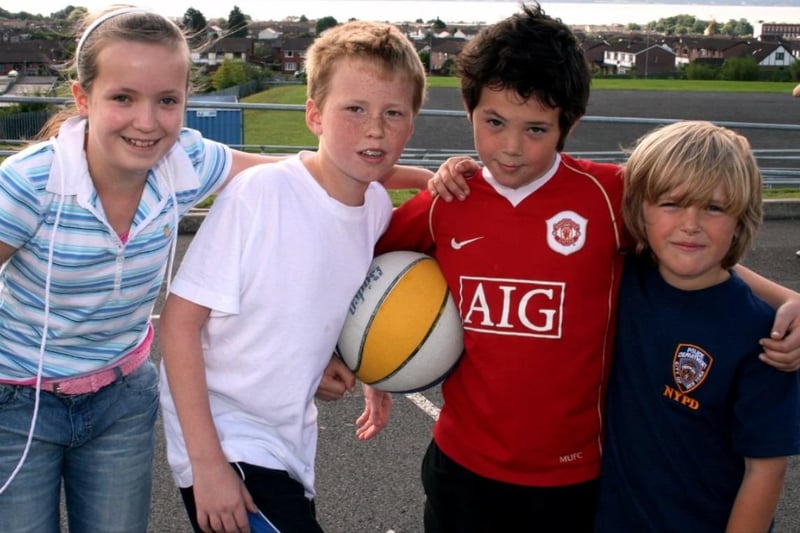 Roseanna Wilson, Alan McCarly , Ted Macartney and Kaelem Mann on Ulidia's basketball courts during the Carrickfergus summer scheme.
