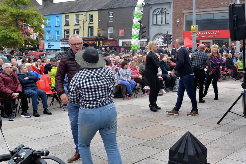 Jiving to the live country music at the main stage during Country Comes To Town on Saturday afternoon. PT38-222.