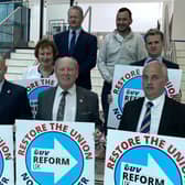 TUV leader Jim Allister with some of his candidates as he signs nomination papers for his general election bid for North Antrim.