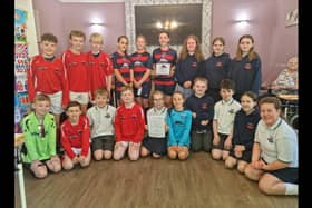 Pupils from Moorfields Primary School took part in the Book Buddies project with residents of Galgorm Care Home in Ballymena.  Photo: Mid and East Antrim Agewell Partnership