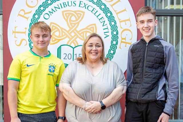 St Ronan's College in Lurgan principal Mrs Fiona Kane with students who received top AS results.