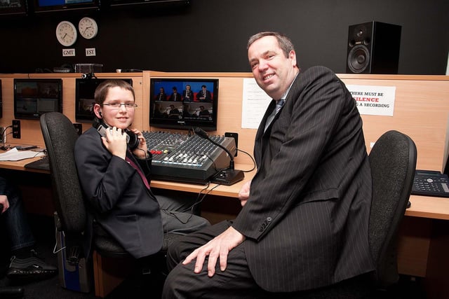 Mr Joseph Johnston, principal, with Tom Bailey at the sound desk during the llvestream at the Lurgan Junior High School open night in 2011.