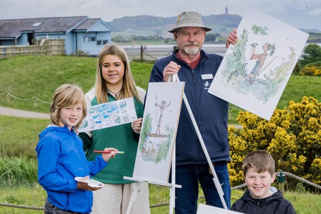 Enjoying some of the activities included in  Drawn to Water: Quentin Blake at WWT, ©Quentin Blake 2023. All rights reserved, running until end of February 2024 at WWT Castle Espie are, from left:Finn, Evvie, Paul Stewart Centre Manager WWT Castle Espie and Eden.