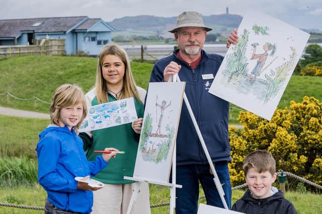 Enjoying some of the activities included in Drawn to Water: Quentin Blake at WWT, ©Quentin Blake 2023. All rights reserved, running until end of February 2024 at WWT Castle Espie are, from left:Finn, Evvie, Paul Stewart Centre Manager WWT Castle Espie and Eden.