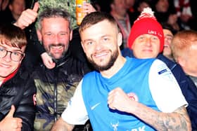 Larne's Andy Ryan celebrates with club supporters.  Photo by David Maginnis/Pacemaker Press