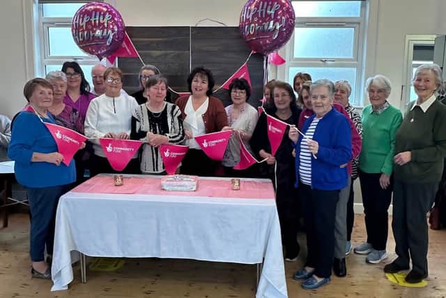 Members of Cranagh & Aghagallon Club celebrating receiving funding from The National Lottery Community Fund. They have been awarded a £19,980 grant to run activities for local older people, including an annual Christmas event, to reduce isolation and loneliness.