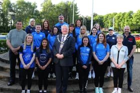 Mayor of Causeway Coast and Glens, Councillor Steven Callaghan pictured at Cloonavin with Ballymoney Ladies FC, alongside Councillor Jonathan McAuley and Councillor Allister Kyle. Credit Causeway Coast and Glens Council