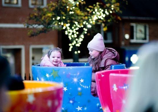 Tilly and Lottie Hastings enjoying the amusements at the Ballyclare switch-on.