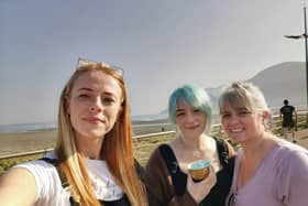 Danni Adams (centre), with friend Maddie (left), and nurse Lisa (right)