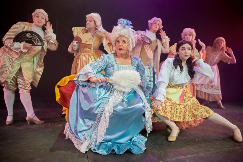 Rosemary O'Connor as Carlotta and Nuala Osborne as Christine with female ensemble members in Portrush Music Society's Northern Ireland premiere of The Phantom of the Opera.