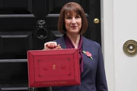 Chancellor of the Exchequer Rachel Reeves poses outside 11 Downing Street, London, with her ministerial red box, before delivering her Budget in the House of Commons. CREDIT NEWS LETTER