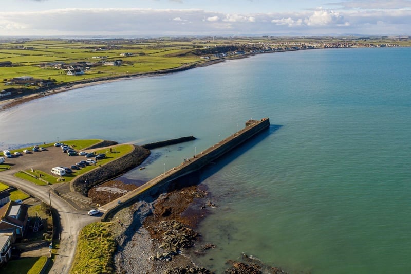 For a peaceful but picturesque coastal drive, the Ards Peninsula offers some of the most scenic routes in Northern Ireland. Only 10 miles from Belfast, this circular route around Strangford Lough is a perfect mix of quiet roads, historic villages, and panoramic water views.  As you drive, you’ll pass charming towns like Portaferry and Cultra, with plenty of opportunities to park up and snap a shot of your car against a backdrop of the lough and the coastline. Find more information here: www.visitardsandnorthdown.com