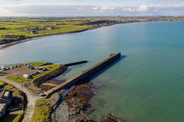 For a peaceful but picturesque coastal drive, the Ards Peninsula offers some of the most scenic routes in Northern Ireland. Only 10 miles from Belfast, this circular route around Strangford Lough is a perfect mix of quiet roads, historic villages, and panoramic water views. As you drive, you’ll pass charming towns like Portaferry and Cultra, with plenty of opportunities to park up and snap a shot of your car against a backdrop of the lough and the coastline. Find more information here: www.visitardsandnorthdown.com