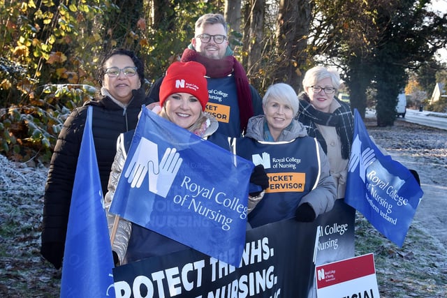 Nurses on picket duty at Craigavon Hospital on Thursday including from left, Rachel Donnelly, Andrea Judge, Andrew Hamill, Val Nugent and Maureen Dolan, RCN NI Board Chair. PT50-201.