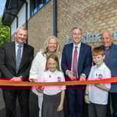 Pictured at the official opening ceremony are, from left to right, chief executive of the Education Authority (EA), Richard Pengelly; principal of Islandmagee Primary School, Arlene Cambridge; Education Minister Paul Givan; chair of the board of governors, William Kane; chair of the board of the EA, Mervyn Storey and pupils, Sara-Jayne and George. Photo@ submitted