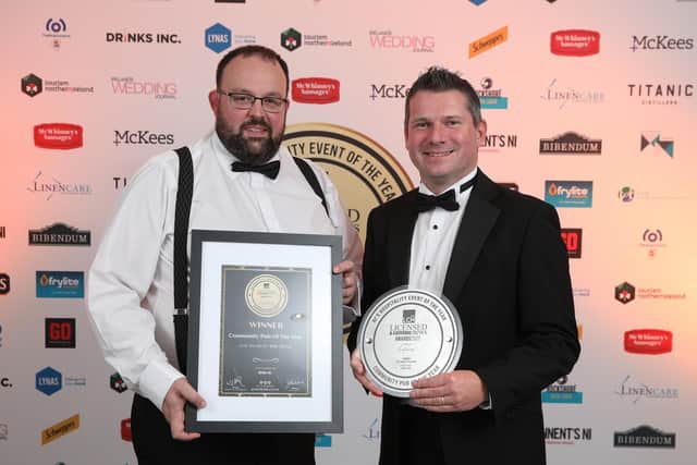 John Lawson from The Head O’ The Road Pub, Portadown is presented with the Community Pub of The Year Award by Richard Mayne of Drinks Inc. who sponsored the award. Picture:  Phil Smyth Photography