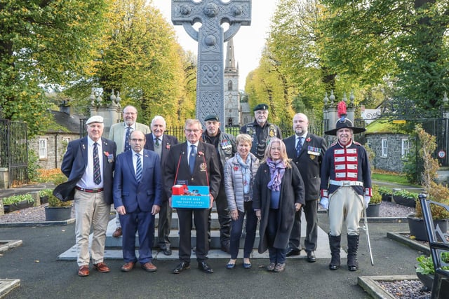 Royal Hillsborough branch held their Poppy Appeal launch  at the village War Memorial. First poppies were bought by Councillor John Palmer and Dawn McEntee, chair of Hillsborough village committee. Branch President, Chairman and vice chairman were present along with members of the branch and the RBL Riders branch. Pic by Norman Briggs, rnbphtographyni