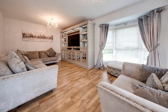 Living room with bay window.