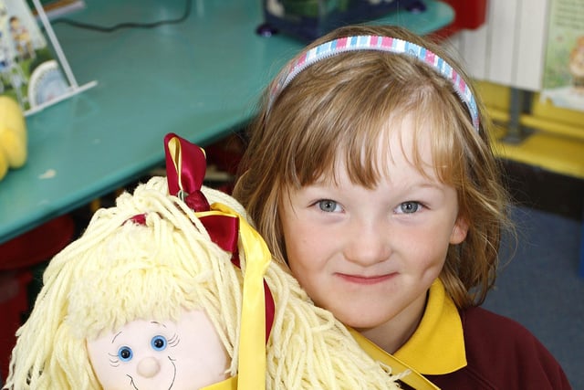 DELIGHTFUL DOLLY...Kelly-Ann plays with a doll in Millburn P1 class