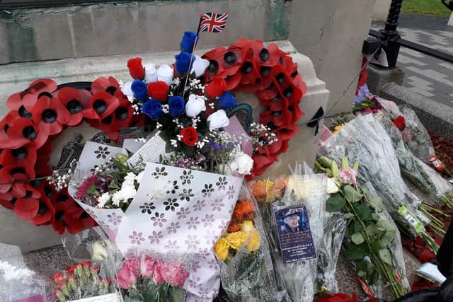 Floral tributes to Her Majesty at Larne Cenotaph. Picture: Local Democracy Reporting Service