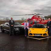 From L-R- Harry Tregenna, Bentley Belfast Sales Manager, Charles Hurst, Colleen Milligan, Air Ambulance NI, Mike Gimson, Aston Martin Belfast Sales Manager, Charles Hurst
