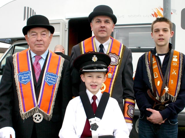 Three generations pictured at the 12th parade in Ballymoney in 2007. Included are little John McLean, father Alan McLean, grandfather Victor McLean and John's brother Timothy.