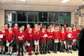 ​The choir were in fine voice as they welcomed visitors to Bridge IPS.