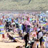 Families enjoying a spell of great weather at Portrush in July 2022. Picture: Steven McAuley/McAuley Multimedia