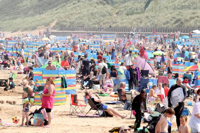 Families enjoying a spell of great weather at Portrush in July 2022. Picture: Steven McAuley/McAuley Multimedia