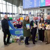 Pictured centre is Declan McKillop and Roisin Colohan of Fareshare NI, Chris Conway CEO of Translink, Fareshare’s Fiona Currie and Peter McVerry, U105 Station Director
