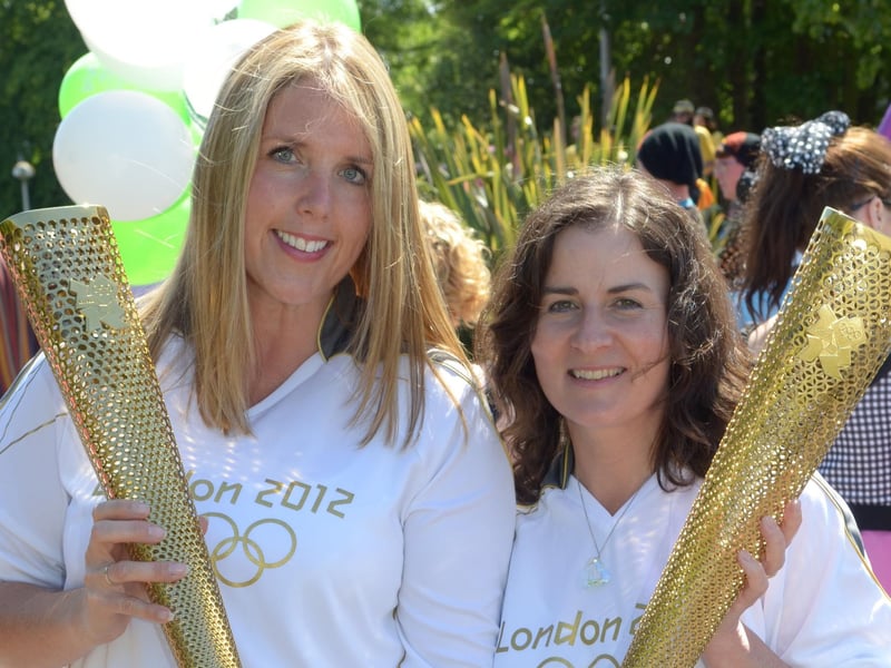 Diane McMillen and Dawn Aston, Olympic torch bearers at the the Larne Alive parade in 2014. INLT 25-440-PR