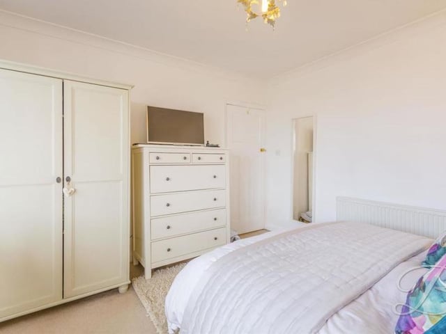 There is lots of wardrobe and storage space in this bedroom.