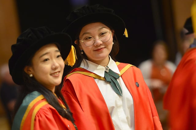Jingshu Tang graduates from Belfast School of Art and Mengyuan Wang with a degree in computing